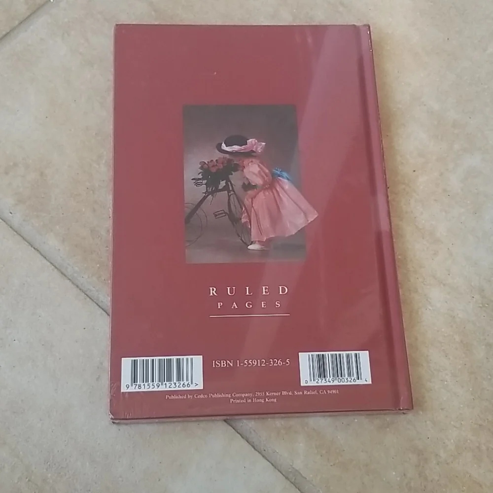 Anne Geddes child in pink dress journal